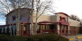 The same Wendy's after the remodel, with a new tower, awnings and patio rail